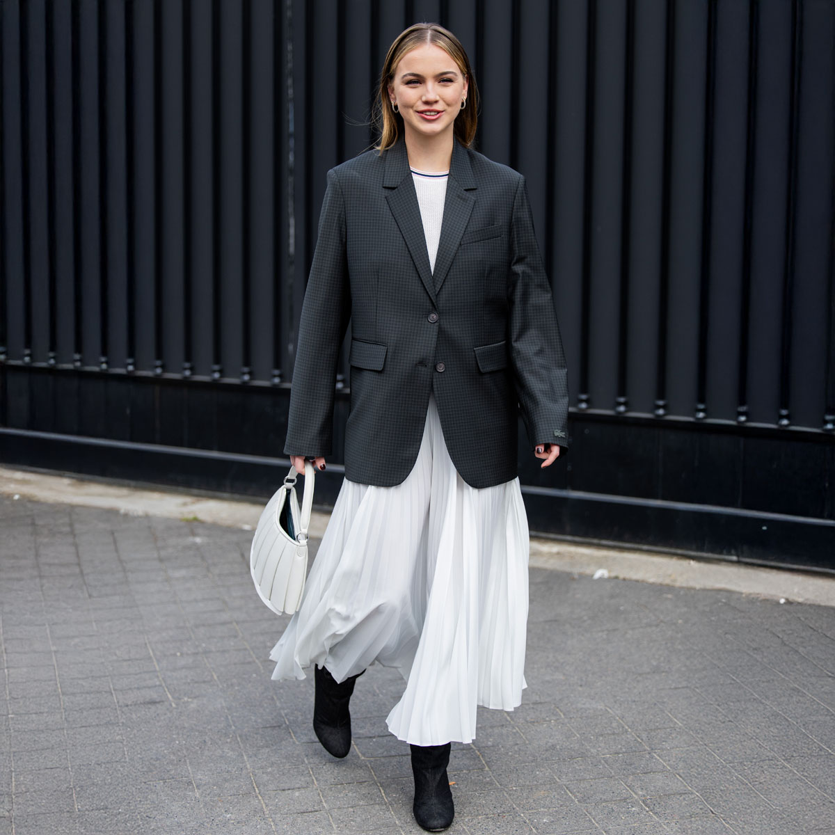 Street Style - Paris Fashion Week - Womenswear Fall/Winter 2025/2026 - Day Seven