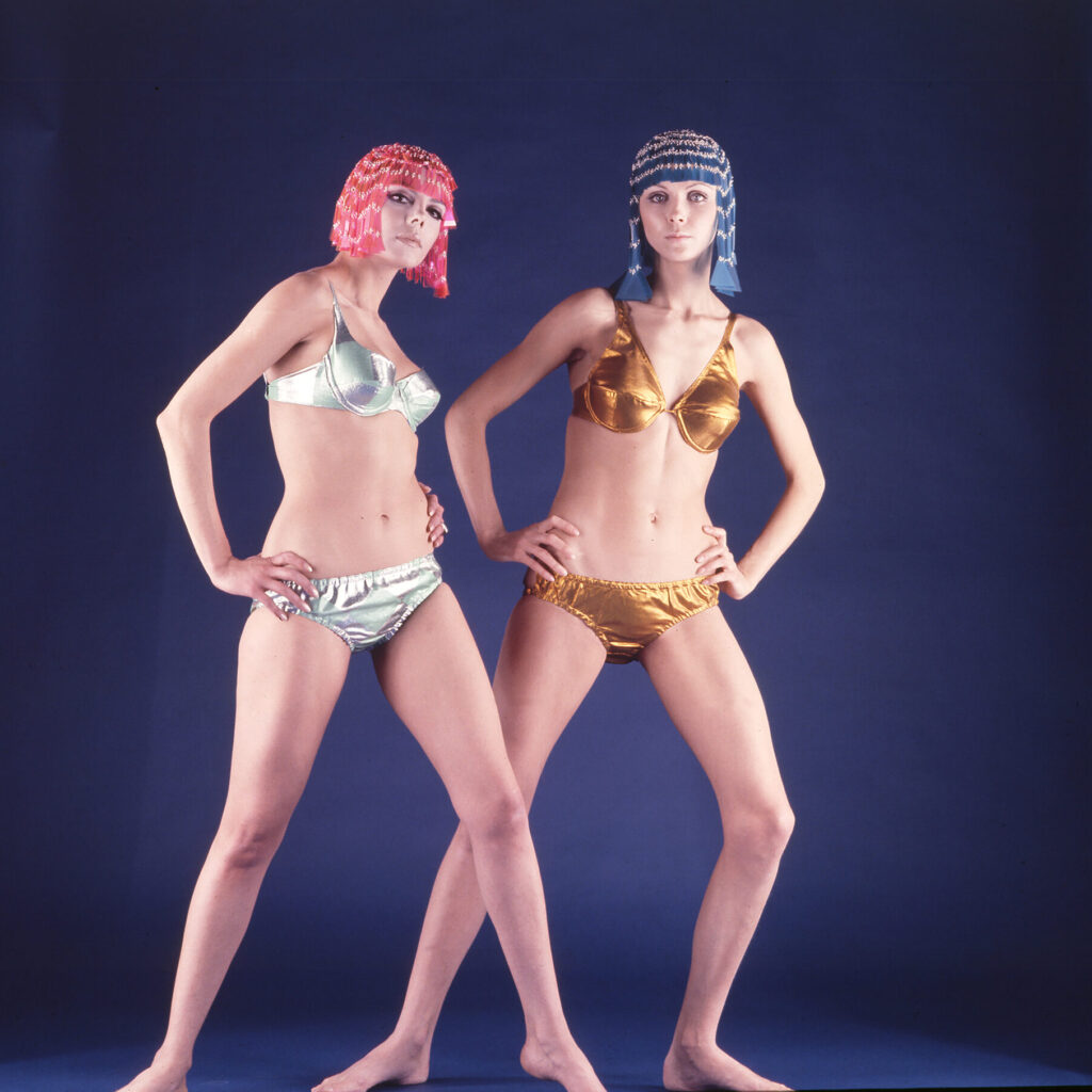Two models in GULP two-piece costumes