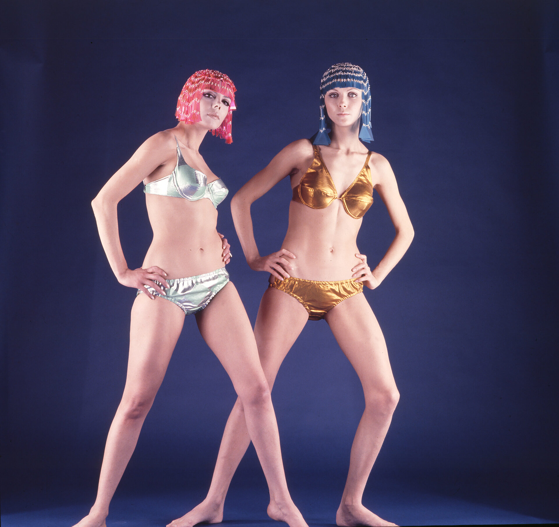 Two models in GULP two-piece costumes