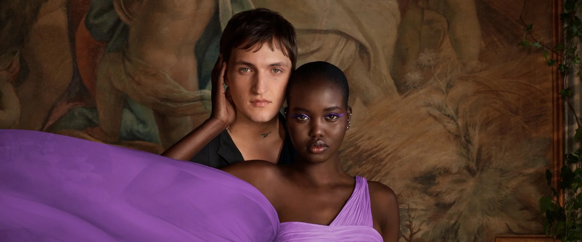 Valentino Man woman in Brown background purple dress Our Global Brands KV DESKTOP copy
